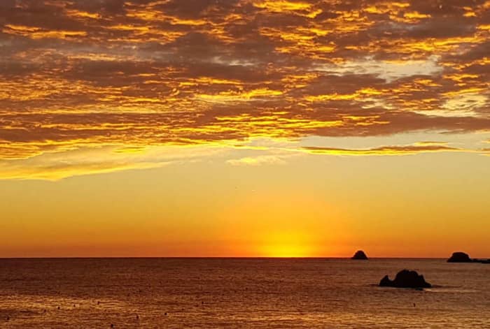 Sunset Cruise & Cave Discovery