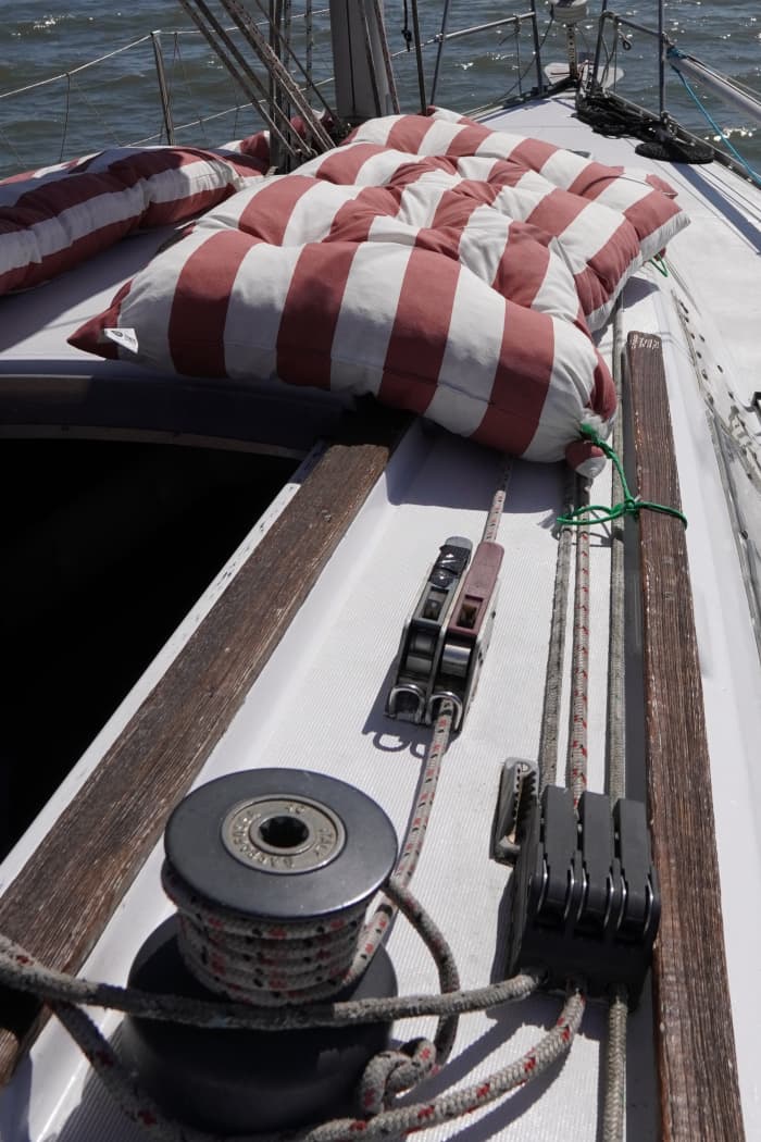 Explore Lisbon aboard a sailboat on the Tagus River, in a private sunset experience.
