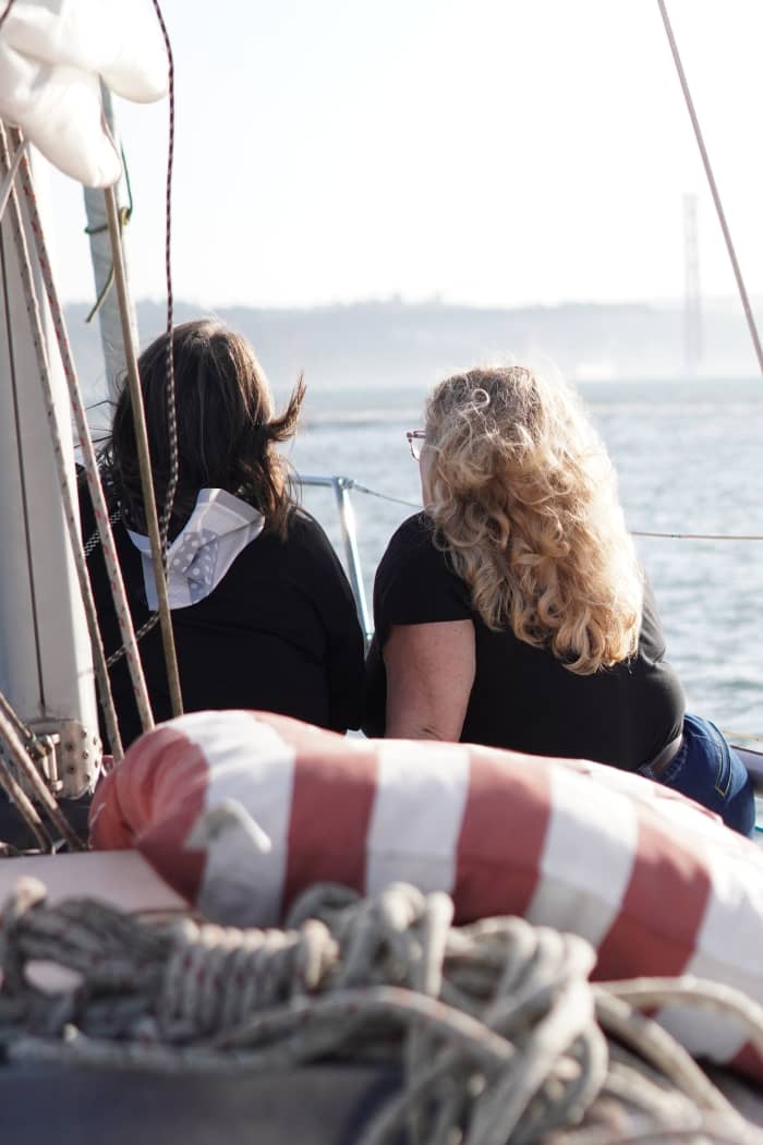 Explore Lisbon aboard a sailboat on the Tagus River, in a private sunset experience.