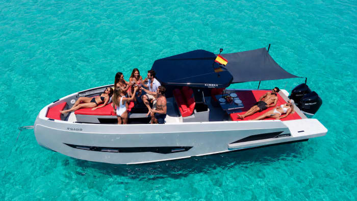 Sail to Formentera in a family motorboat, up to 12 people, includes: captain, drinks, towels, snorkeling, paddle surfing, fuel. This route €300