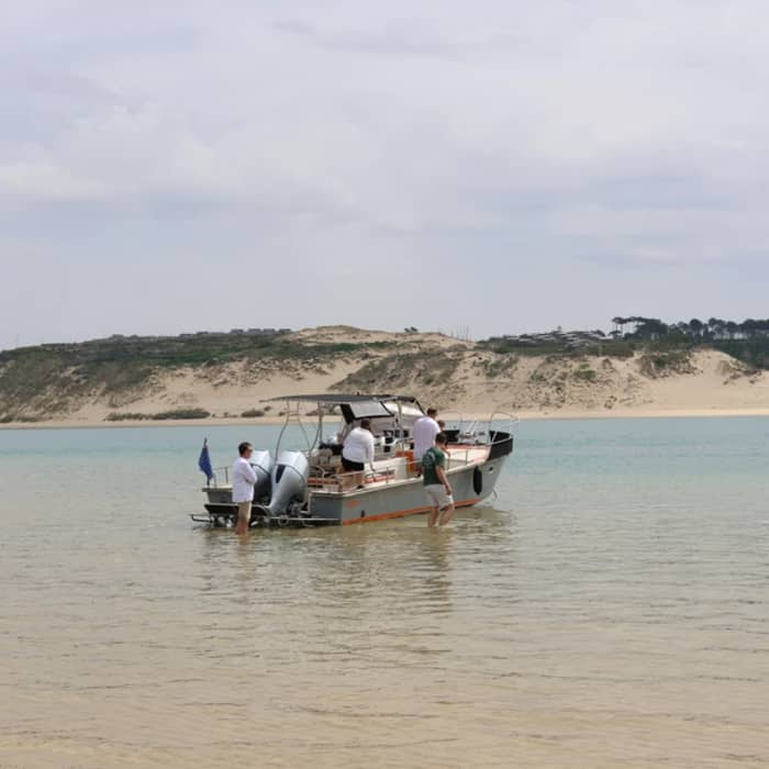 Medio día a medida en el agua en la cuenca de Arcachon