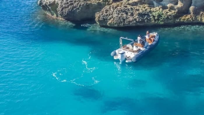 Sunset tour by dinghy in the Gulf of Cagliari with a typical Sardinian aperitif