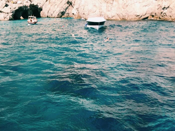 Capri: Caves, Stories and Faraglioni Boat Experience