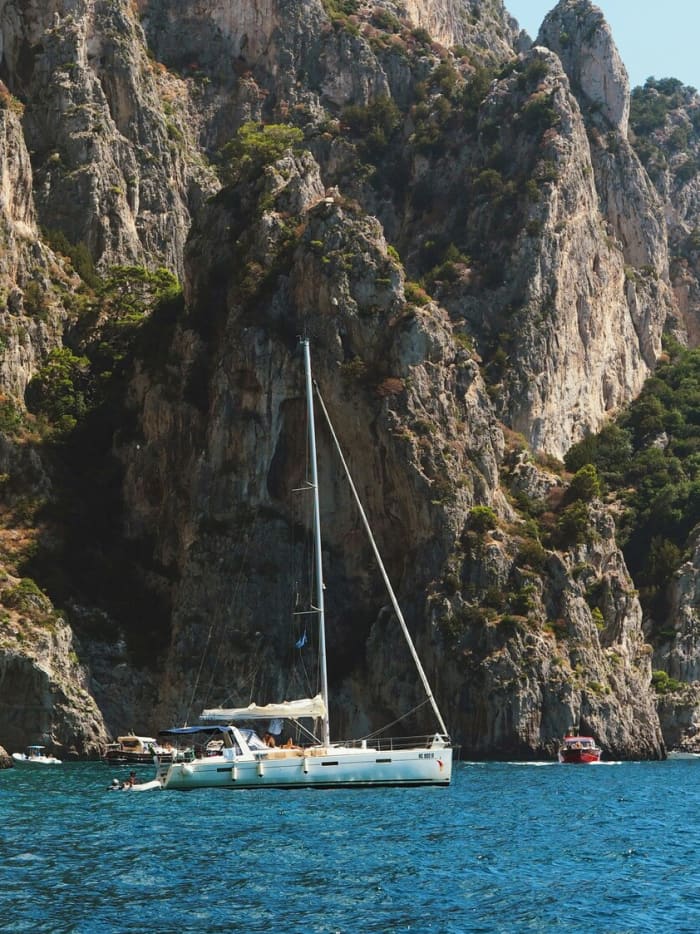 Capri: Caves, Stories and Faraglioni Boat Experience