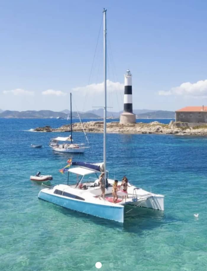Day trip exploring the islands & wild coves by catamaran