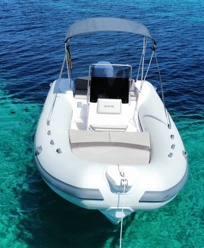 Full day on a private boat, caves, coves and turquoise waters