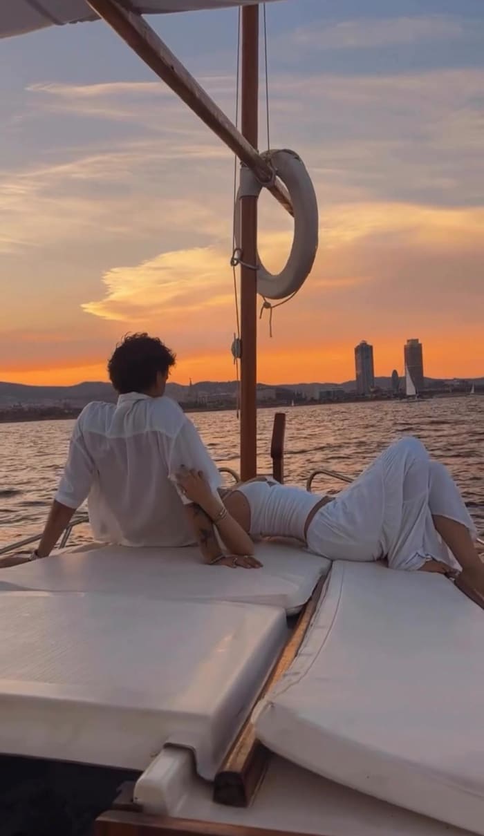Private sunset in Barcelona: Traditional Mediterranean boat.