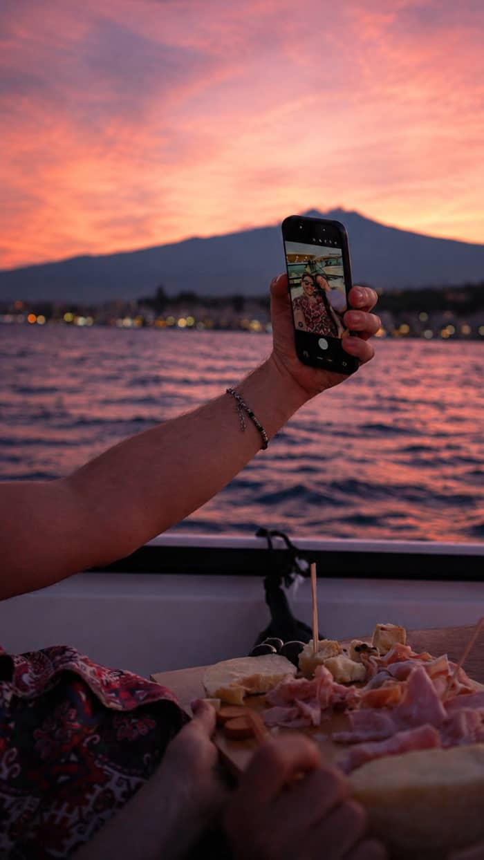 Your sunset in Taormina or among the Faraglioni of Acitrezza.
