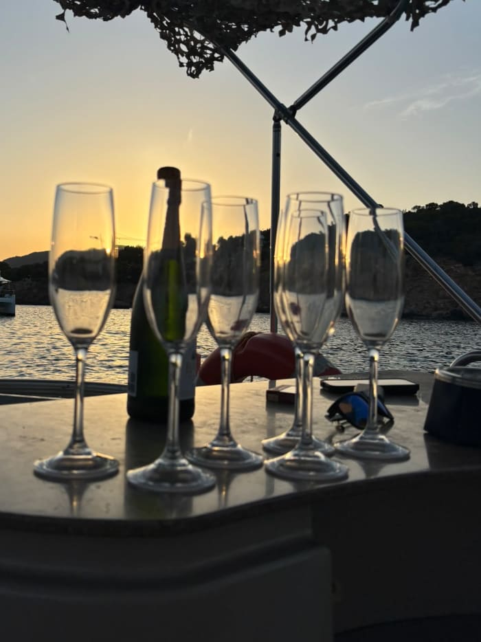 Sunset from the sea · The coast of Palmanova at sunset