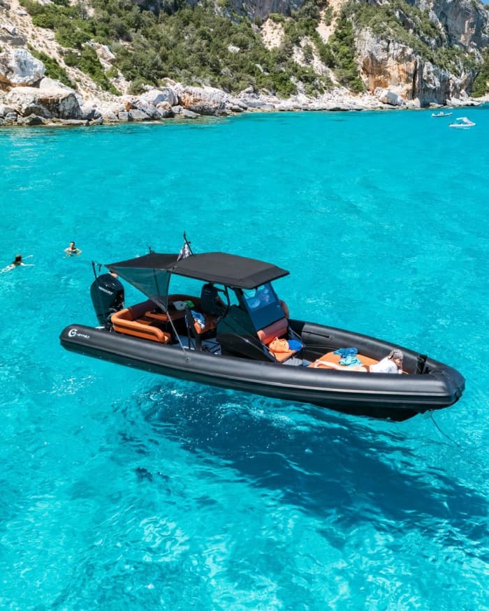 Sunset on a dinghy in the Gulf of Orosei: aperitif on board and sunset coves