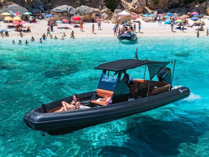 Sunset on a dinghy in the Gulf of Orosei: aperitif on board and sunset coves