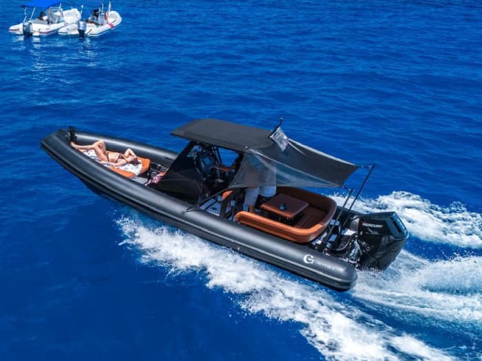 Sunset on a dinghy in the Gulf of Orosei: aperitif on board and sunset coves