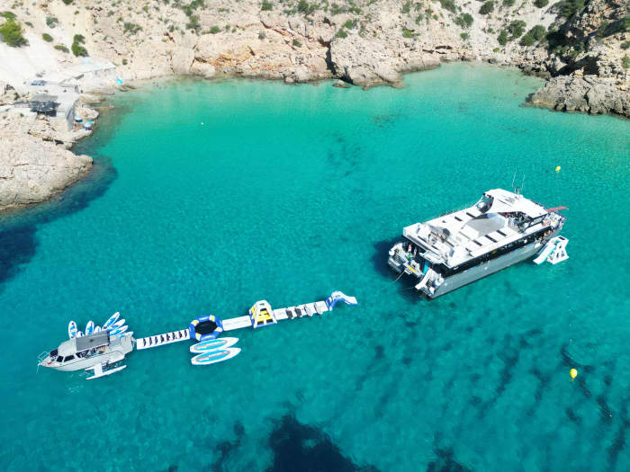 Full-Day Private Charter aboard a Floating Beach Club Catamaran · Ibiza & Formentera