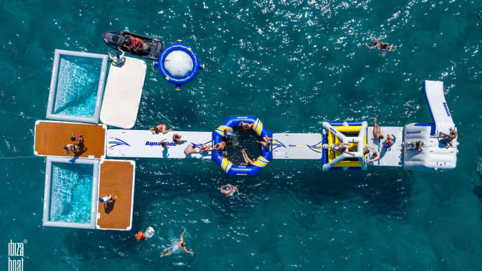 Full-Day Private Charter aboard a Floating Beach Club Catamaran · Ibiza & Formentera