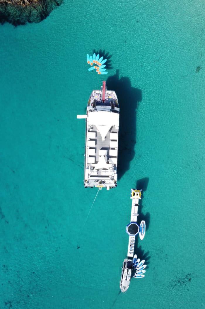 Full-Day Private Charter aboard a Floating Beach Club Catamaran · Ibiza & Formentera