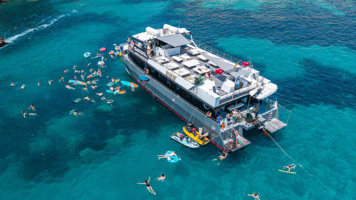 Full-Day Private Charter aboard a Floating Beach Club Catamaran · Ibiza & Formentera