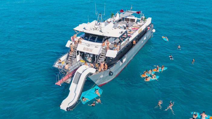 Full-Day Private Charter aboard a Floating Beach Club Catamaran · Ibiza & Formentera