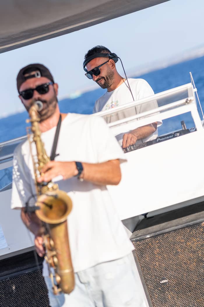 Full-Day Private Charter aboard a Floating Beach Club Catamaran · Ibiza & Formentera