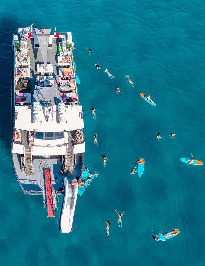 Full-Day Private Charter aboard a Floating Beach Club Catamaran · Ibiza & Formentera
