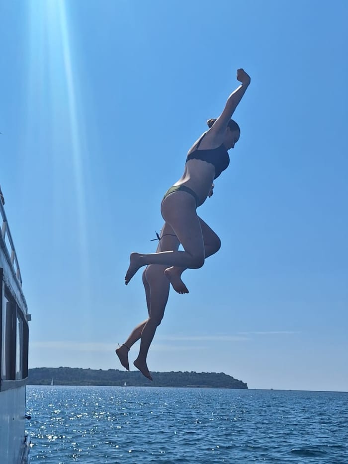Pula: Private Sunset Dolphin Cruise with BBQ Dinner & Drinks