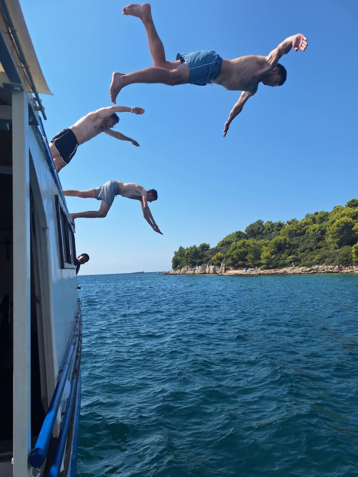 Pula: Private Sunset Dolphin Cruise with BBQ Dinner & Drinks