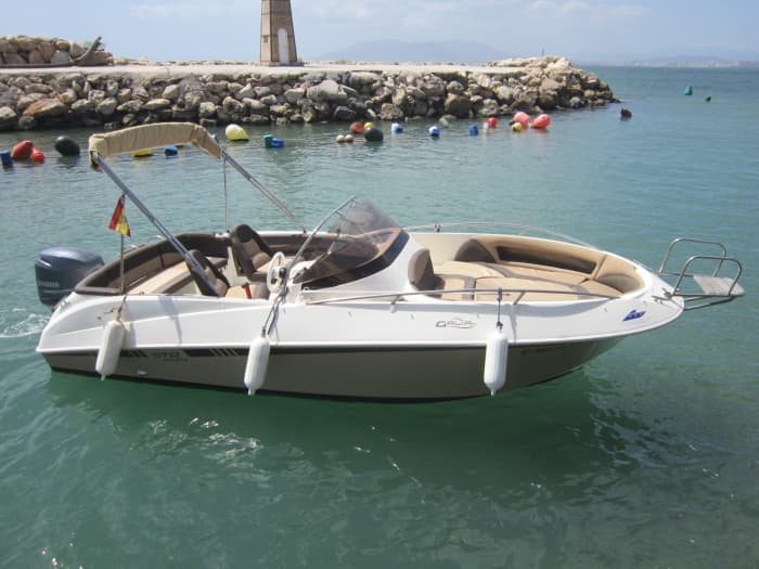 Discover Málaga on a full-day trip on a motorboat