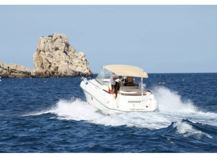 Discover Xàbia's shores: A complete day trip aboard a motorboat