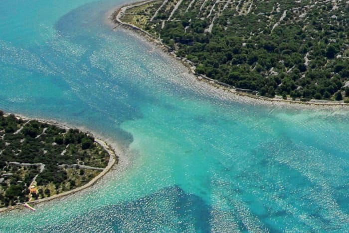 Discover Biograd na Moru's shores: A complete day trip aboard a motorboat