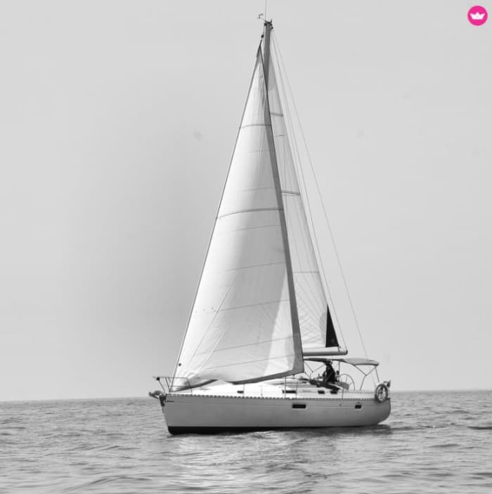 Explore Puerto Banús and enjoy a full day of sailing on a sailboat