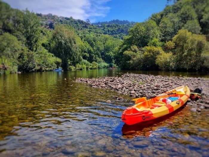 Sailing on the Paiva River with a visit to “Ilha dos Amores” (Lovers' Island).