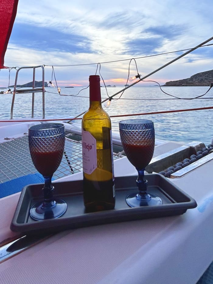 Sail around the west of Ibiza on a sailing catamaran
