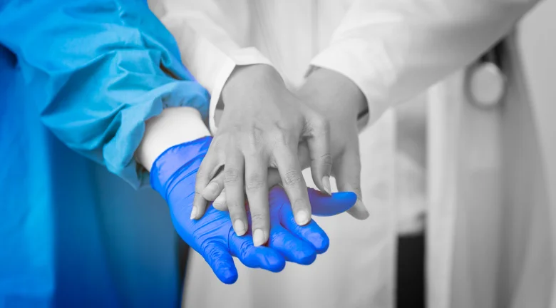 Orthopedic hand examination with blue gloves