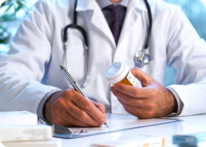 Doctor writing a treatment note