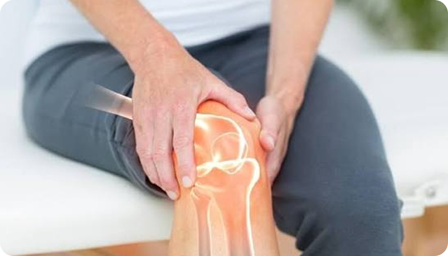 Person holding a painful knee joint