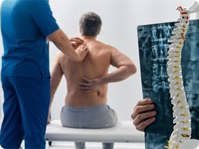 Doctor examining a patient's spine