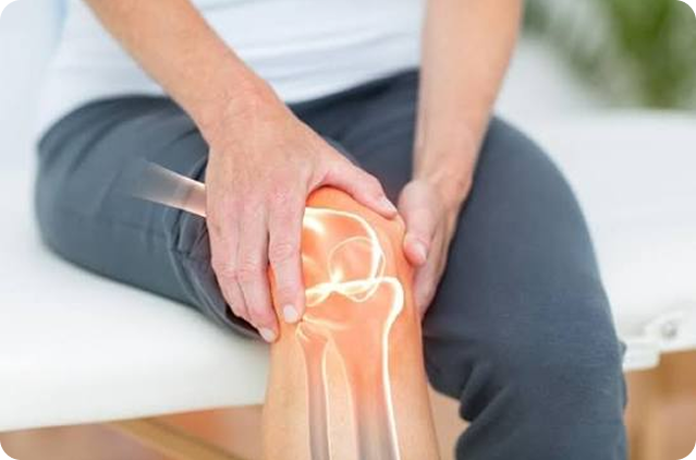 Person holding their neck in pain