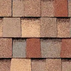 Designer asphalt shingles allow for unique looks and greater durability and color options