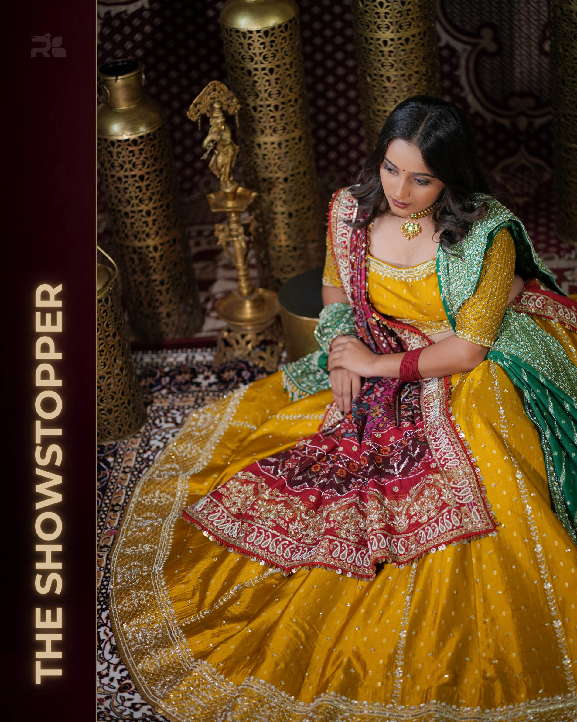 Bride in a richly coloured couture ensemble