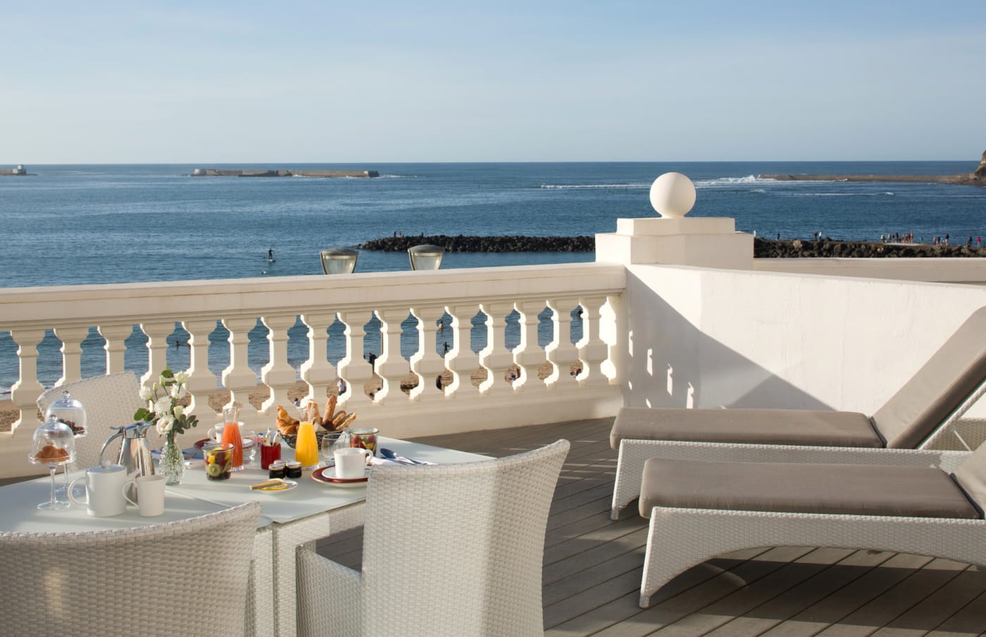 Terrace of a Suite Terrasse Océan at the Grand Hôtel in Saint-Jean-de-Luz, with a white balustrade and views of the Atlantic