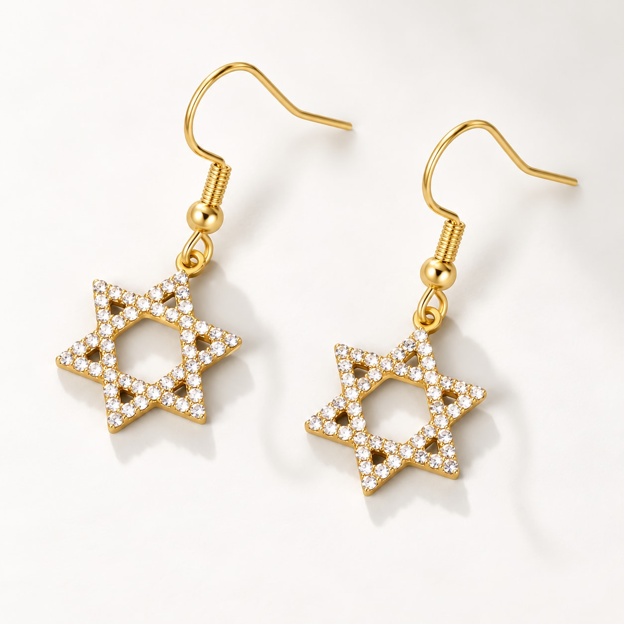 Boucles d’oreilles étoile de David à zircons — détail