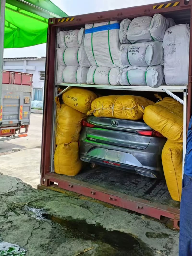 A car packed into a container with bagged cargo at the Skyways warehouse in China