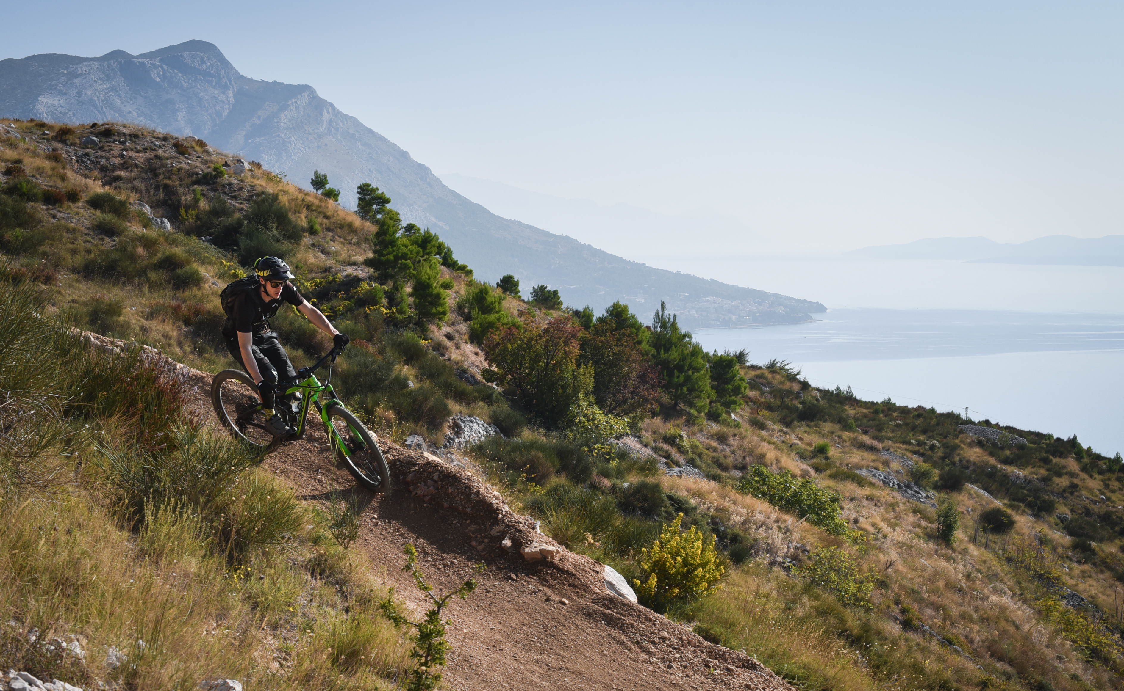 Coast Riders rider riding the trail above Omiš, Croatia.