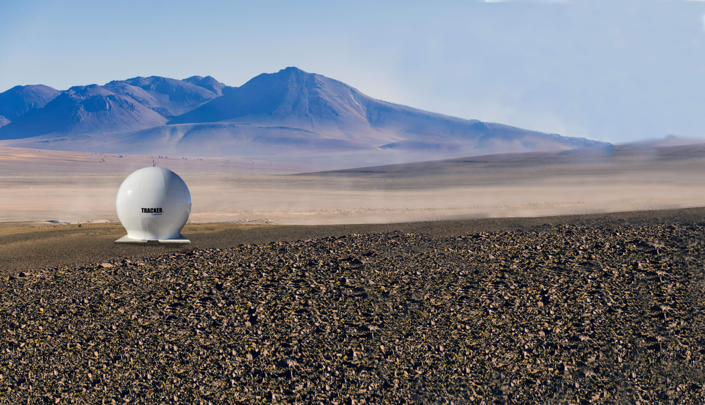 TRACKER in desert w mountains.jpg