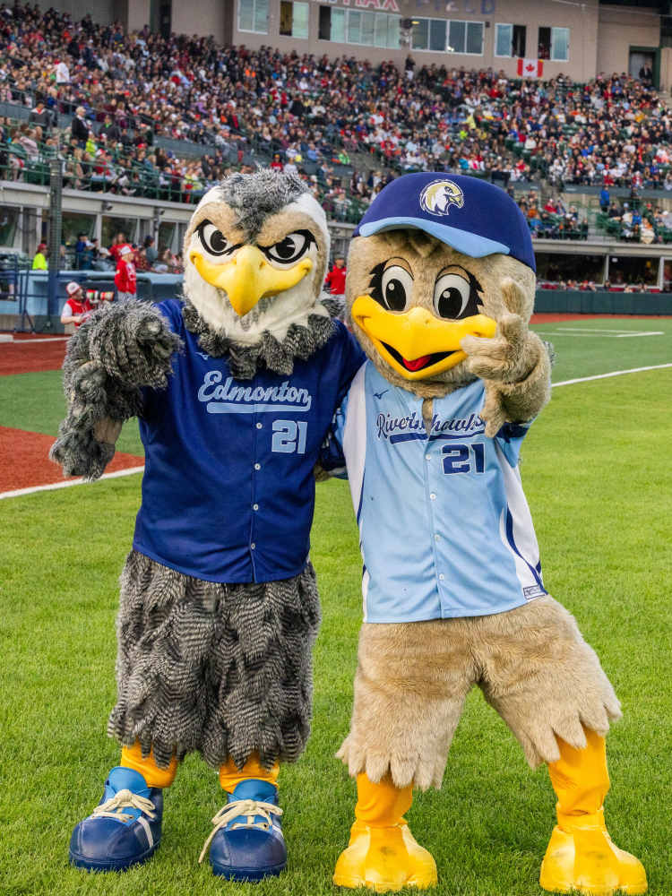 Riverhawks msacots River and Kid posing for camera