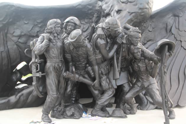 Shoulder to Shoulder Even the Fallen Stand Tall