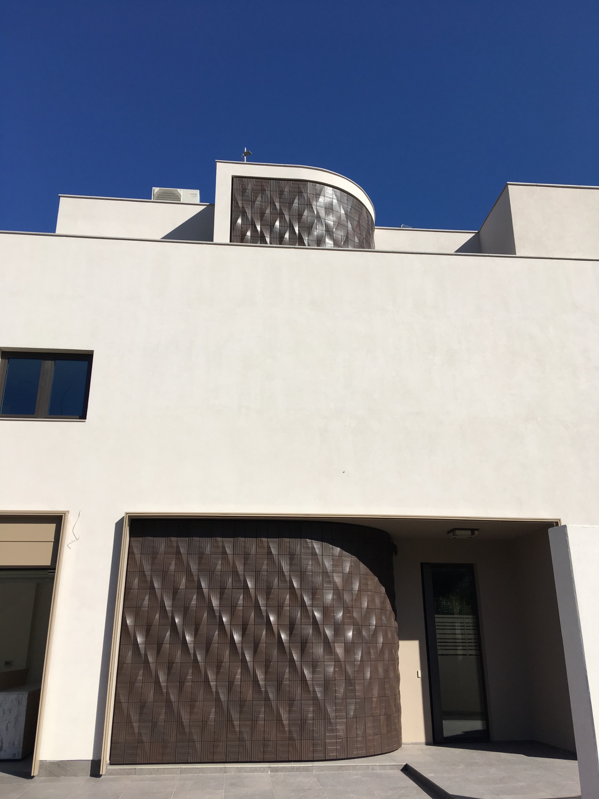 White Wave and Brown Wall