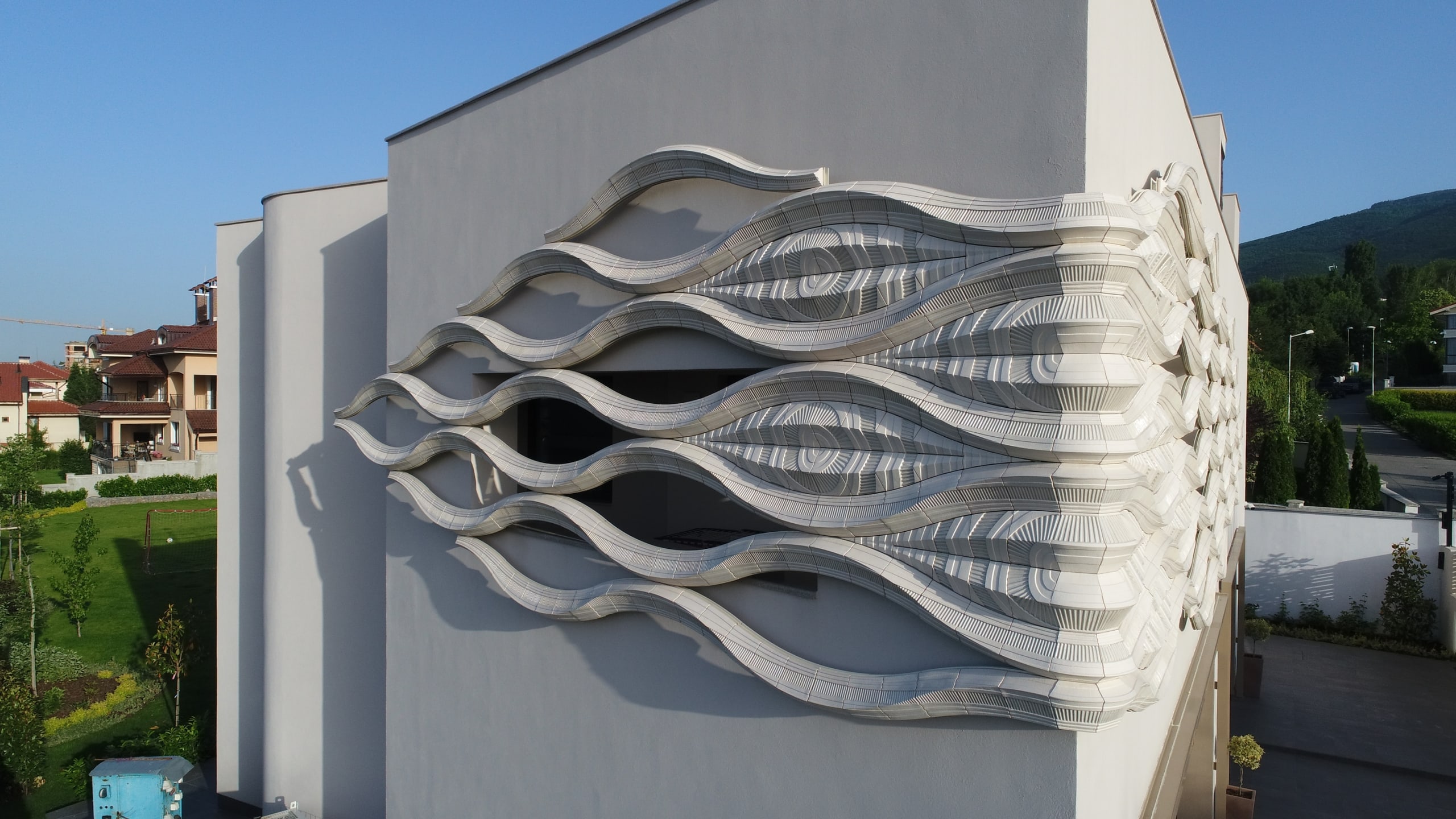 White Wave and Brown Wall