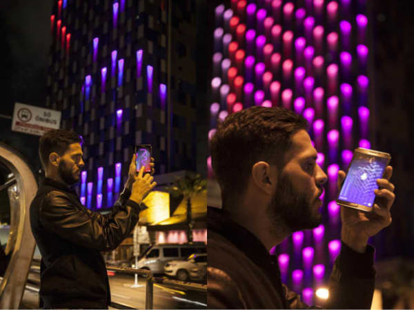 Keynote Speaker Guto Requena's "Light Creature" allows viewers to interact with the building through a mobile app.