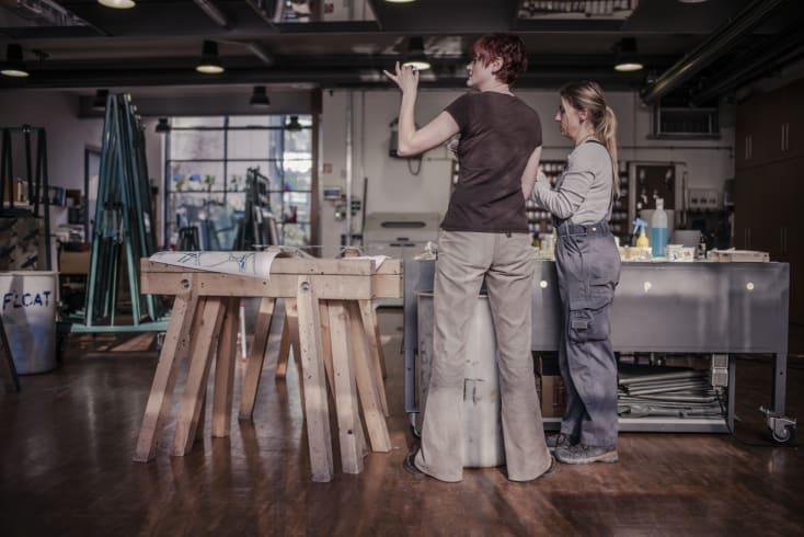 Two of the Mayer painters work in the Float Glass studio. Mayer of Munich was involved in developing float glass painting as early as 1984 and has completed many projects using various techniques since then. Image and copyright by Sammy Hart