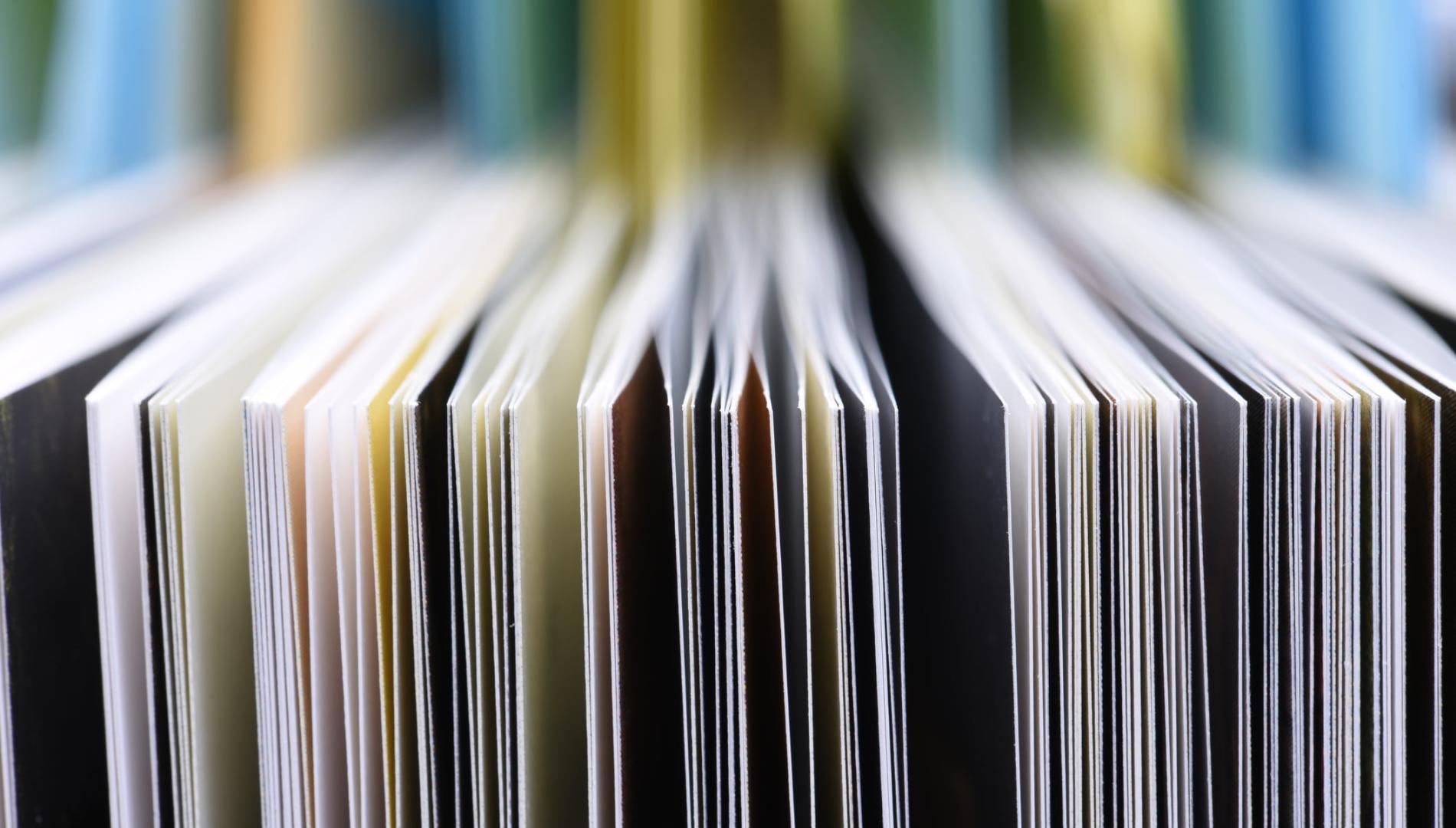 Close-up of vertical pages of a publication 